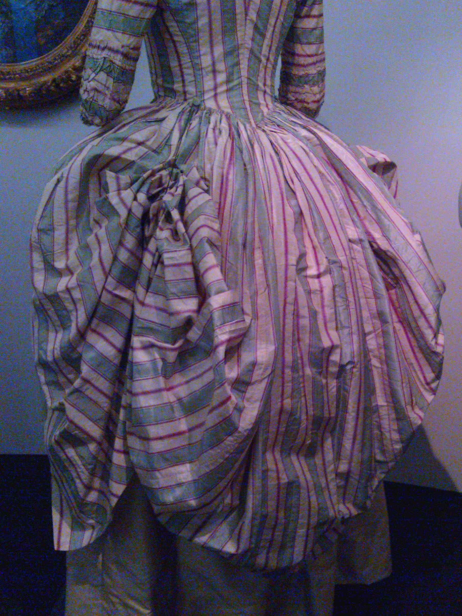 Dress with bustle